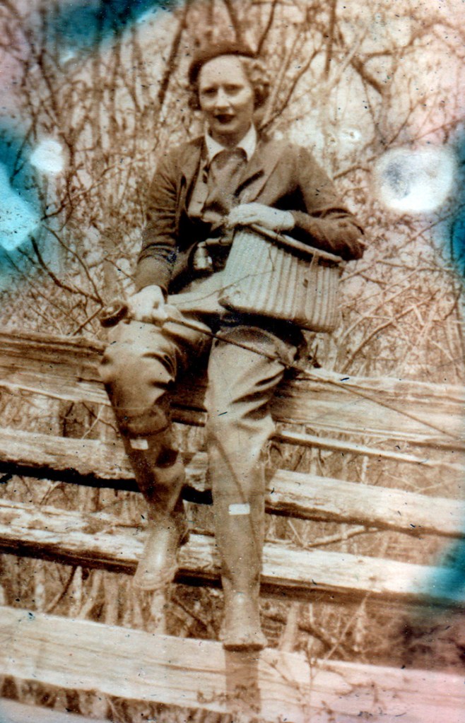 woman in fishing gear, 1930s